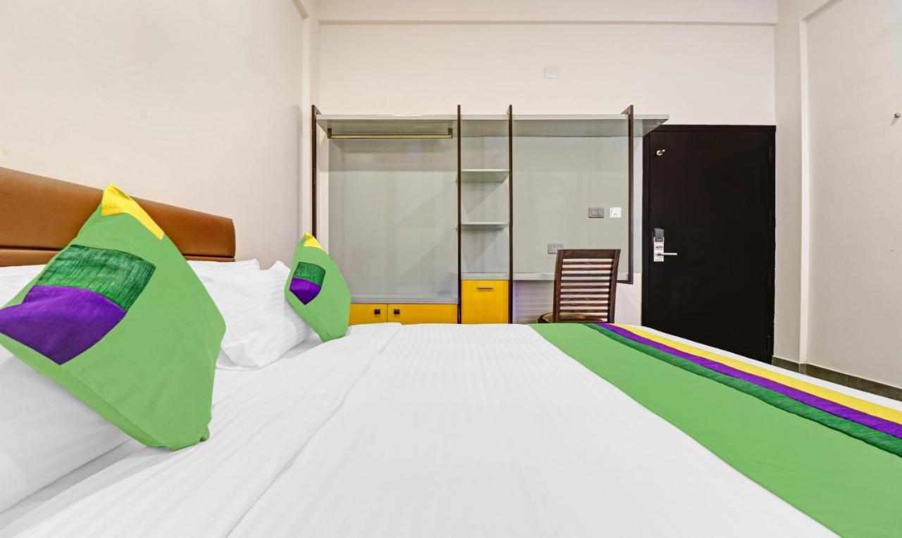 Treebo Grand Vistara Airport Suites Коччи Экстерьер фото