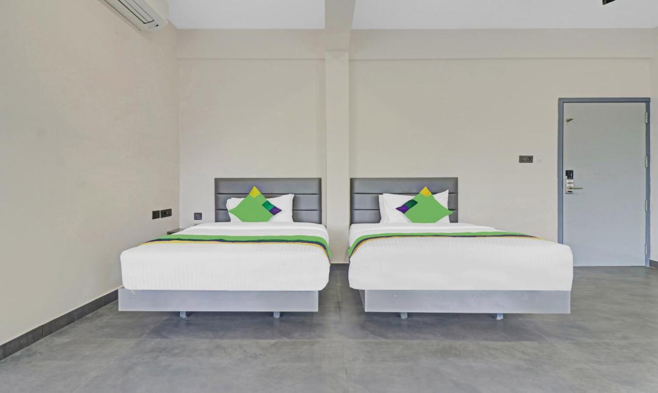 Treebo Grand Vistara Airport Suites Коччи Экстерьер фото