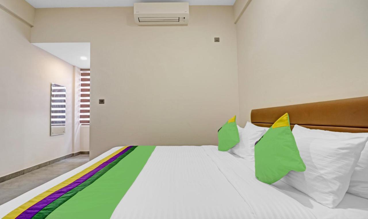 Treebo Grand Vistara Airport Suites Коччи Экстерьер фото
