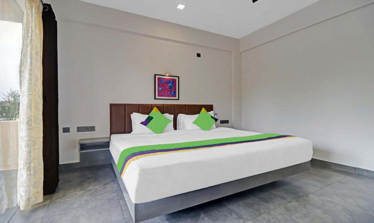 Treebo Grand Vistara Airport Suites Коччи Экстерьер фото