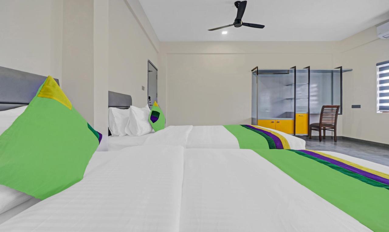 Treebo Grand Vistara Airport Suites Коччи Экстерьер фото