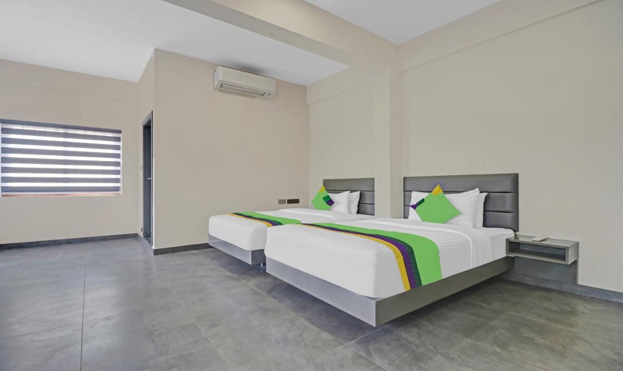 Treebo Grand Vistara Airport Suites Коччи Экстерьер фото